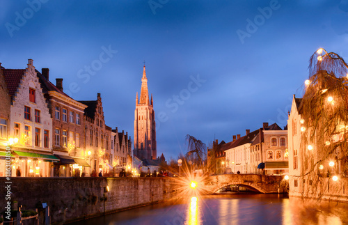 Bruges cityscapes during christmas with lights and blue skies, Belgium 
