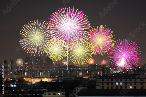 Fireworks on the sky in city