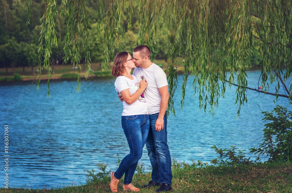 Loving young couple on background of the river. Loving young couple on background of the river.