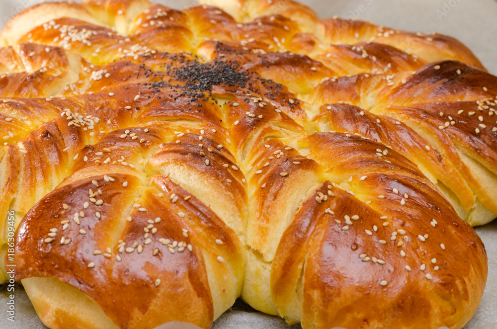 Baked salty bread stuffed with sheep milk cheese and studded with cumin Baked salty bread stuffed with sheep milk cheese and studded with cumin