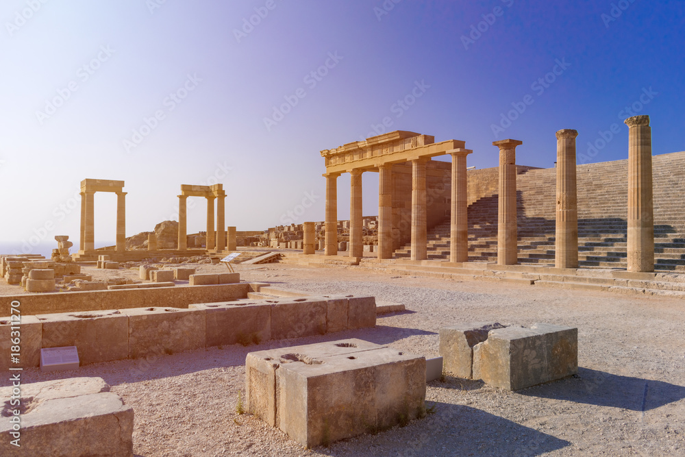Fototapeta premium Stoa, portico and Propylaea on Acropolis of Lindos (Rhodes, Greece)
