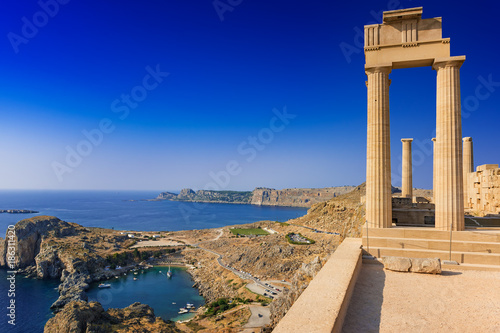 View of St. Paul´s bay and ancient temple of goddess Athena on acropolis of Lindos (Rhodes, Greece)