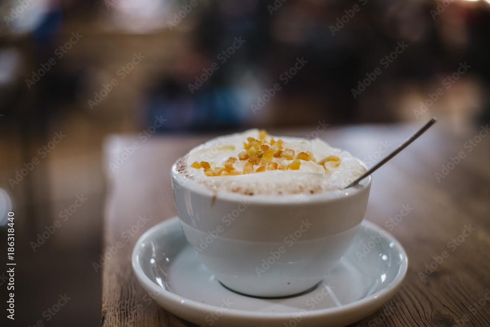 close up on hot coffee with orange in the bar close up on hot coffee with orange in the bar