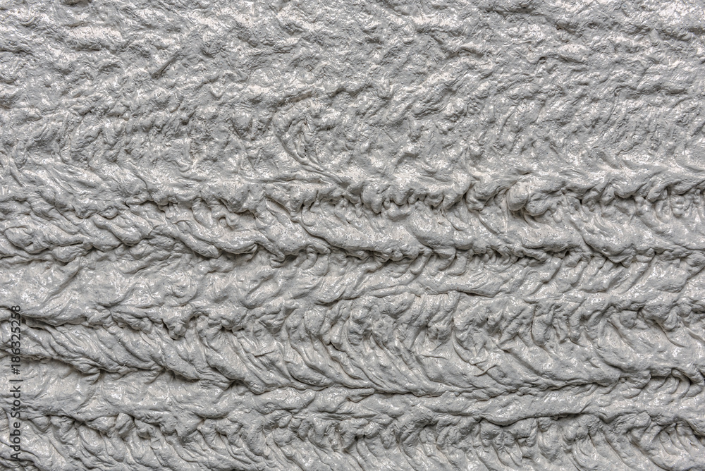 Mortar wall texture. with a pluster pump on the construction applied mortar wall. Concept: texture Mortar wall texture. with a pluster pump on the construction applied mortar wall. Concept: texture