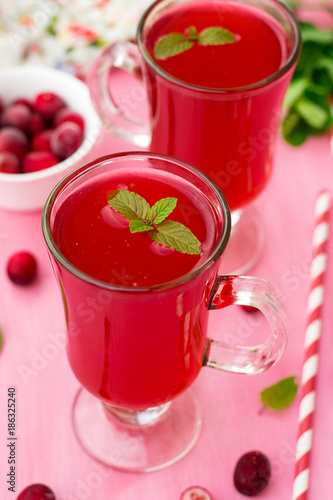 Russian traditional drink kissel with cranberries and mint