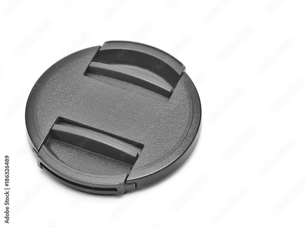 Lens cap in black and white color The object is on white background with copy space for put text is on the right. Lens cap in black and white color The object is on white background with copy space for put text is on the right.