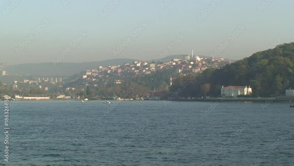 Buildings in distance near coast, POV Buildings in distance near coast, POV