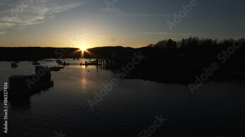 Wide, scenic sunset over Maine lake