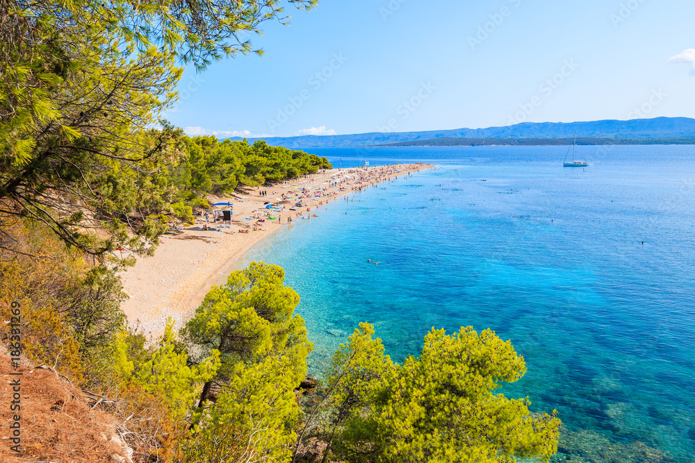 View of beautiful beach Zlatni Rat at Bol on Brac island in summertime, Croatia