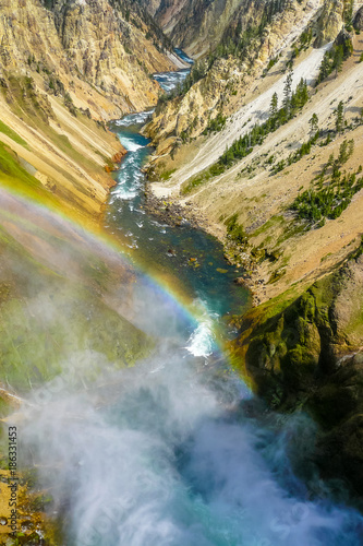 Yellowstone waterfall with rainbow at inspiration point