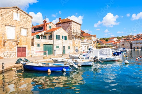 Fototapeta Naklejka Na Ścianę i Meble -  View of Milna port with colorful fishing boats and houses, Brac island, Croatia