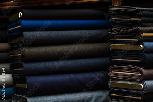 Suit Fabrics with Dark Color on a Fabric Shop Shelf