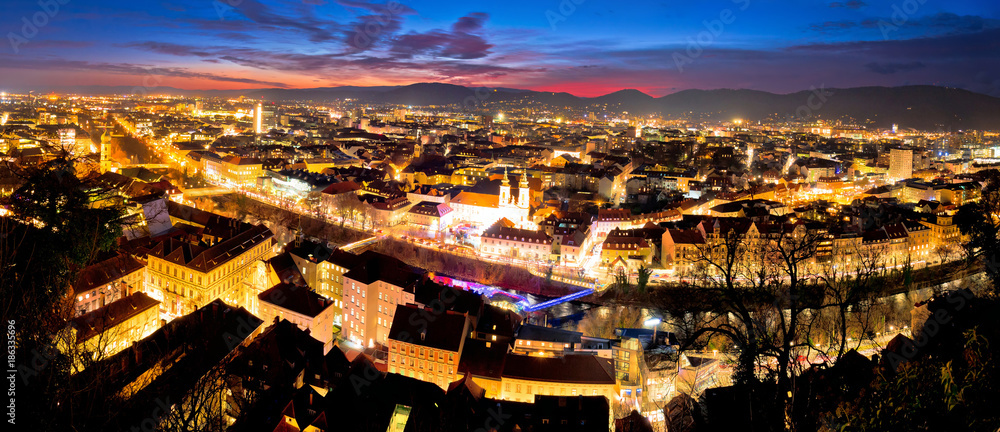 Graz aerial night panoramic view from Schlossberg