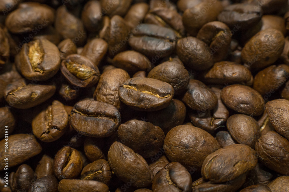 Roasted Coffee Beans macro close up image for background. Roasted Coffee Beans macro close up image for background.