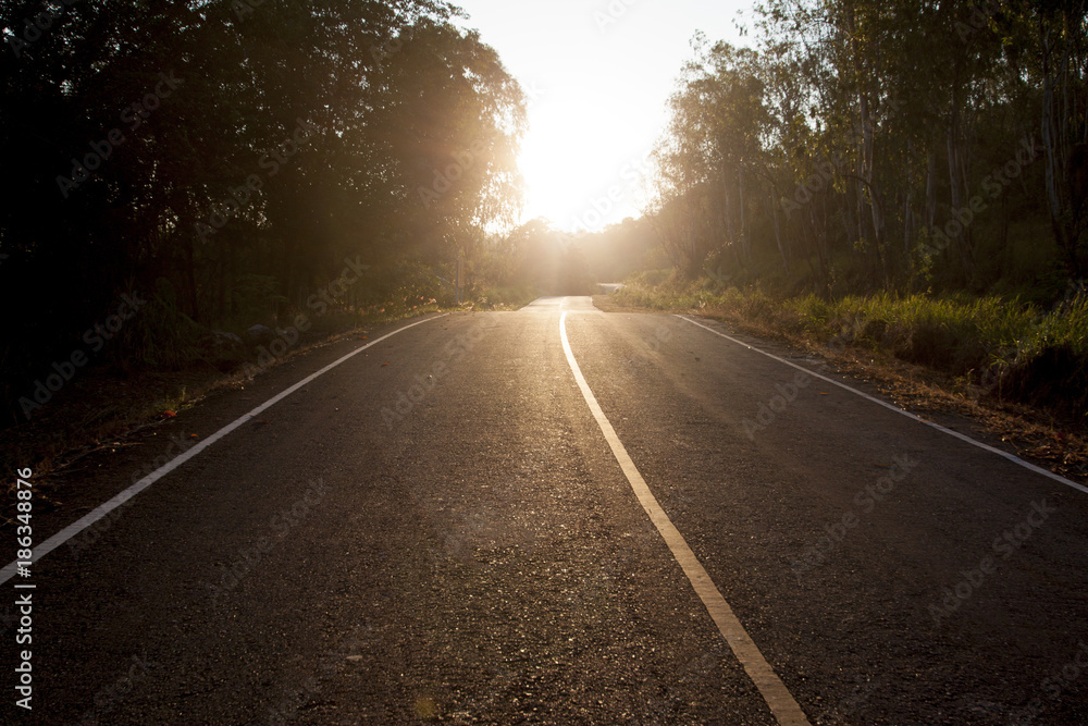 Fototapeta premium Road trip to goal and travel on brightest morning with sunrise.