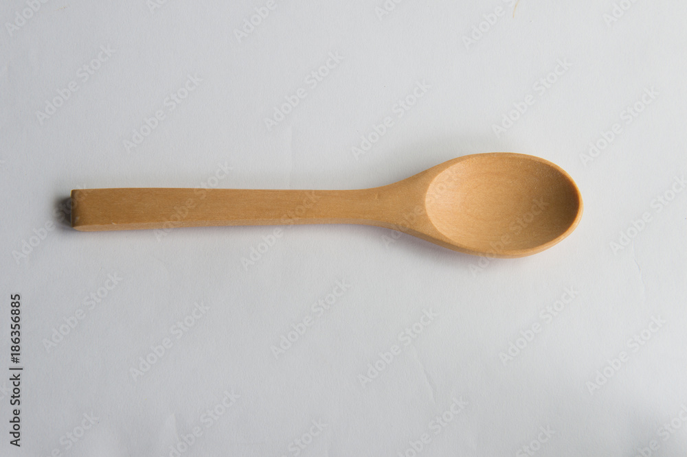 Wooden spoon isolated on white background Wooden spoon isolated on white background