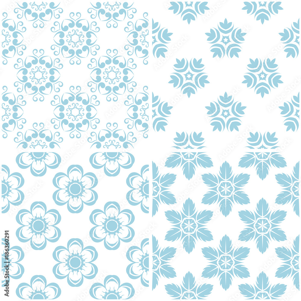 Floral patterns. Set of light blue elements on white. Seamless backgrounds Floral patterns. Set of light blue elements on white. Seamless backgrounds