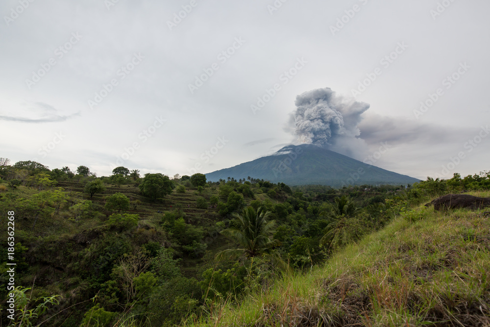 Mount Agung volcano erupting in Bali Indonesia. 