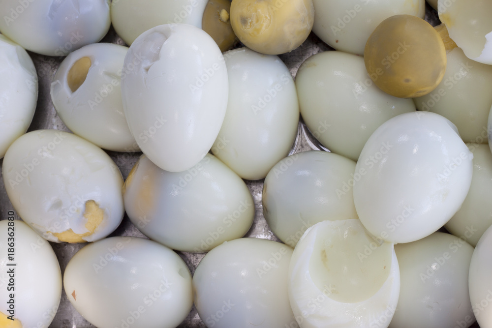 Boiled egg is placed in a metal container. Boiled egg is placed in a metal container.
