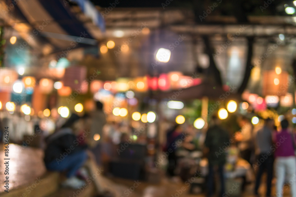 Image of shopping place with light blurred bokeh abstract background.