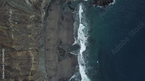 video of waves lapping a rocky shore in Tenerife