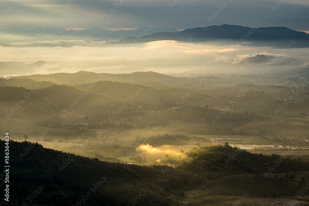 Morning light and sea of mist with landscape of Laos 