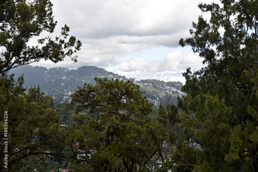 BAGUIO CITY, PHILIPPINES, DECEMBER 13, 2017, SM Store Shopping mall and city view from top of the Building, the summer Capital of Philippines BAGUIO CITY, PHILIPPINES, DECEMBER 13, 2017, SM Store Shopping mall and city view from top of the Building, the summer Capital of Philippines