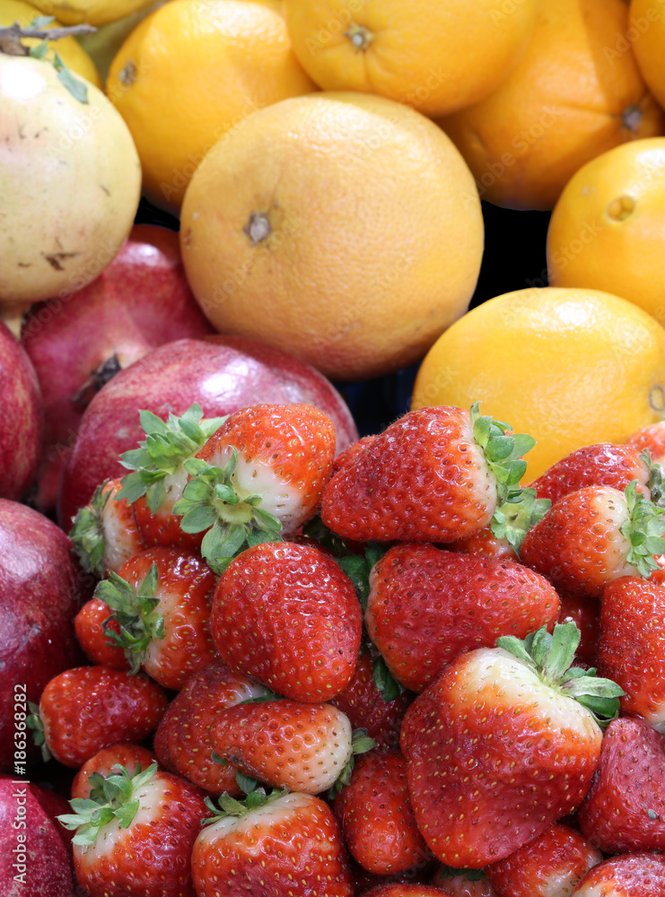 background of fresh fruit with strawberries pomegranes oranges background of fresh fruit with strawberries pomegranes oranges
