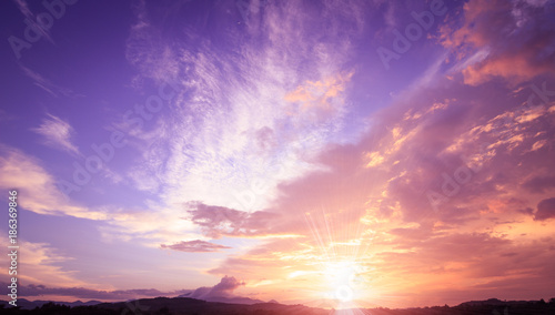 World environment day concept: Amazing dramatic sky mountain sunset background 