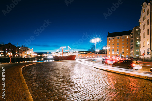 Helsinki, Finland. View Of Pohjoisranta Street In Evening Or Night photo