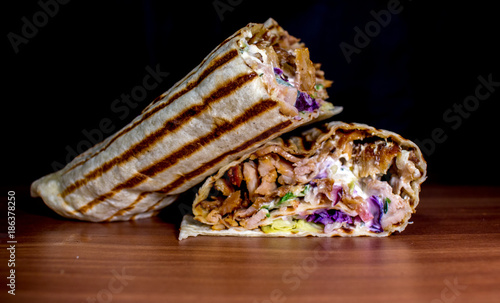 Konstfotografi dürüm döner kebab on a wooden surface