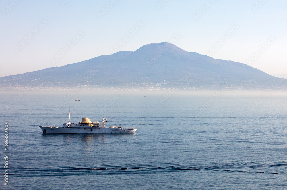  Cruise ship in Sorrento gulf with Vesuvio background during a cruise on Capri. Campania, Italy