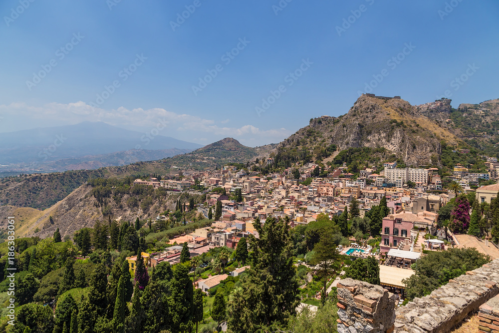 Taormina, Sicily. A picturesque view of the city. In the background, Mount Etna