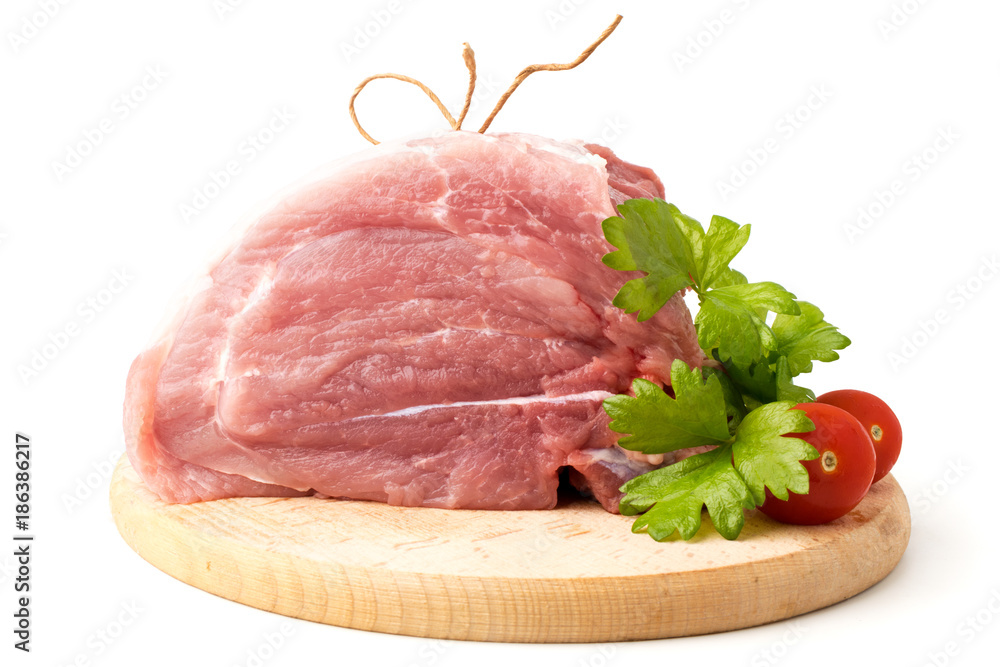 Fresh raw meat with parsley leaves and tomatoes. Fresh raw meat with parsley leaves and tomatoes.