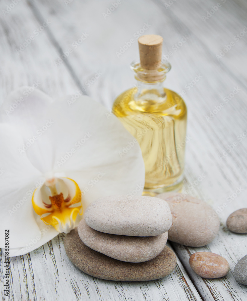 Spa products and white orchids Spa products and white orchids