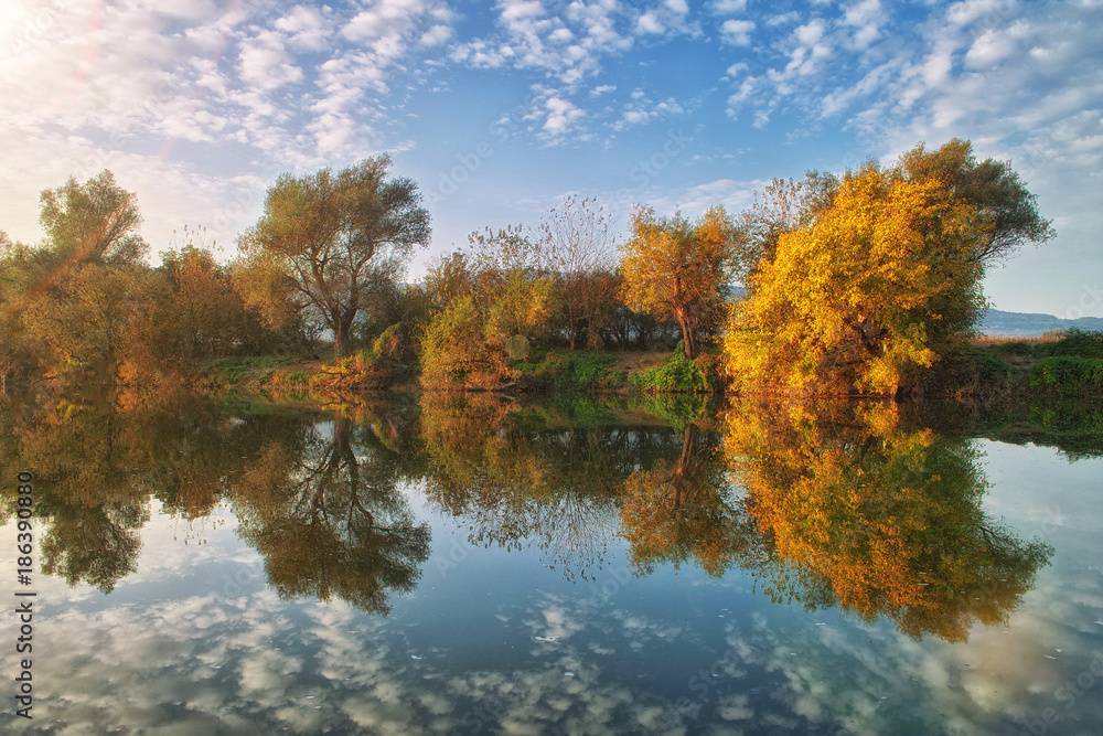 Autumn reflections over the river Autumn reflections over the river