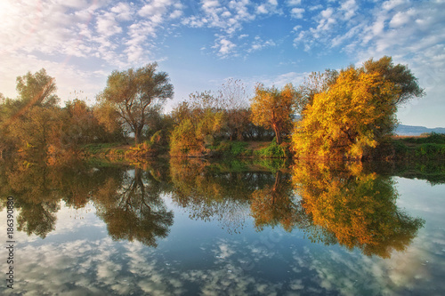Autumn reflections over the river