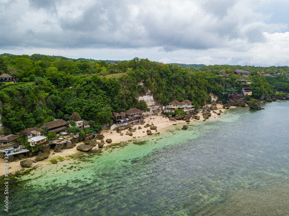 Coastline near Padang padang beach (Labuan Sait Beach) aerial view from drone, Bali island, Indonesia Coastline near Padang padang beach (Labuan Sait Beach) aerial view from drone, Bali island, Indonesia