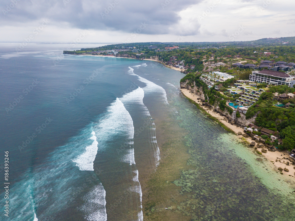 Coastline near Padang padang beach (Labuan Sait Beach) aerial view from drone, Bali island, Indonesia