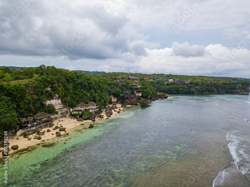 Coastline near Padang padang beach (Labuan Sait Beach) aerial view from drone, Bali island, Indonesia photo