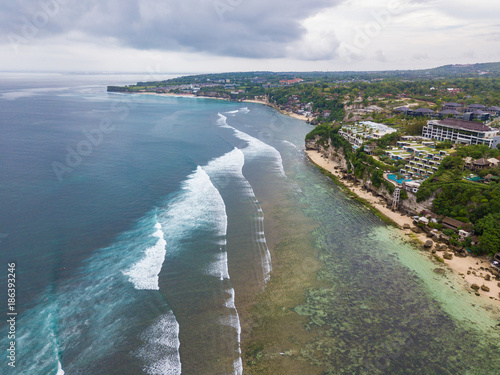 Coastline near Padang padang beach (Labuan Sait Beach) aerial view from drone, Bali island, Indonesia