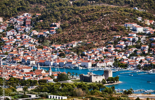Aerial view of the castle and the city of Trogir in Croatia. © GKor