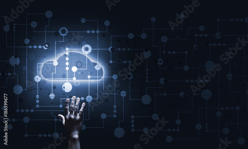 Technology idea concept with glowing cloud icon and touching it finger