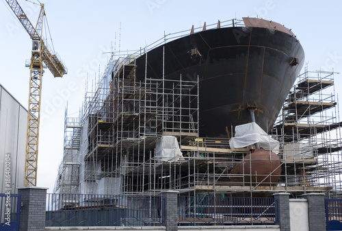 Shipbuilding construction large ship scaffold harbor harbour coastal industrial Ferguson dock yard inverclyde glasgow greenock Scotland uk photo