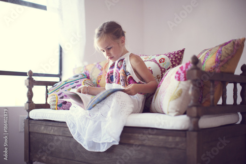 Child reading a book