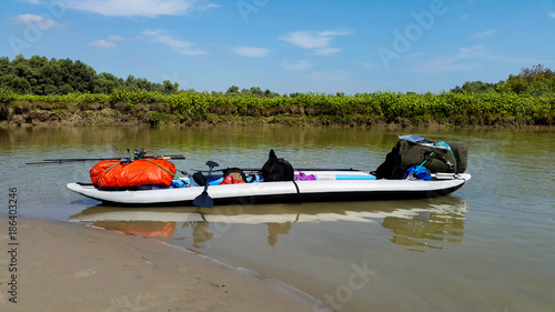 Kayak ashore equipped for touring