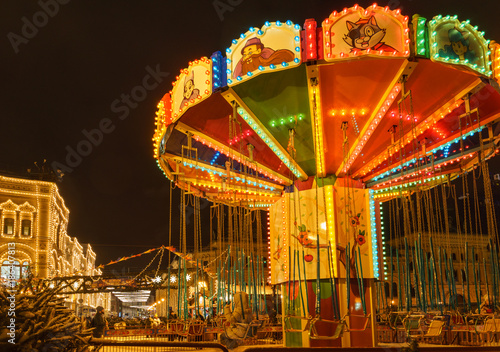 Carousel on Christmas market on Red Square in Moscow  © larisa_stock
