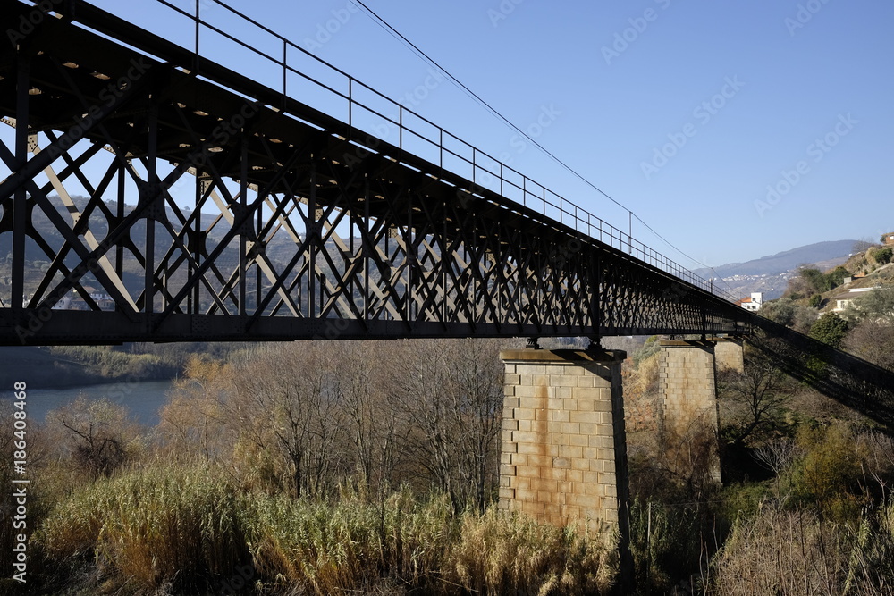 Fototapeta premium railway iron bridge at granjao
