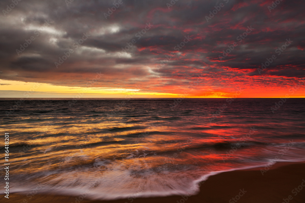 A sunset over looking the water at Port Noarlunga Beach