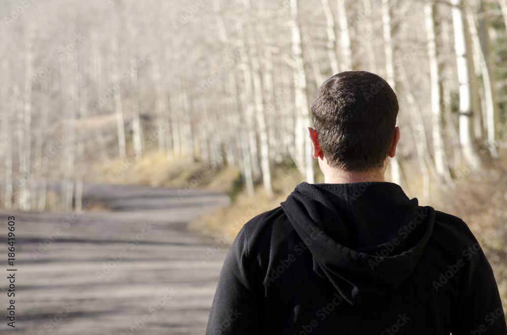 Man looking ahead to the path in front of him. Man looking ahead to the path in front of him.